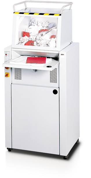 Image of a small scale industrial shredder. The hopper at the top is full of paper to be shredded.